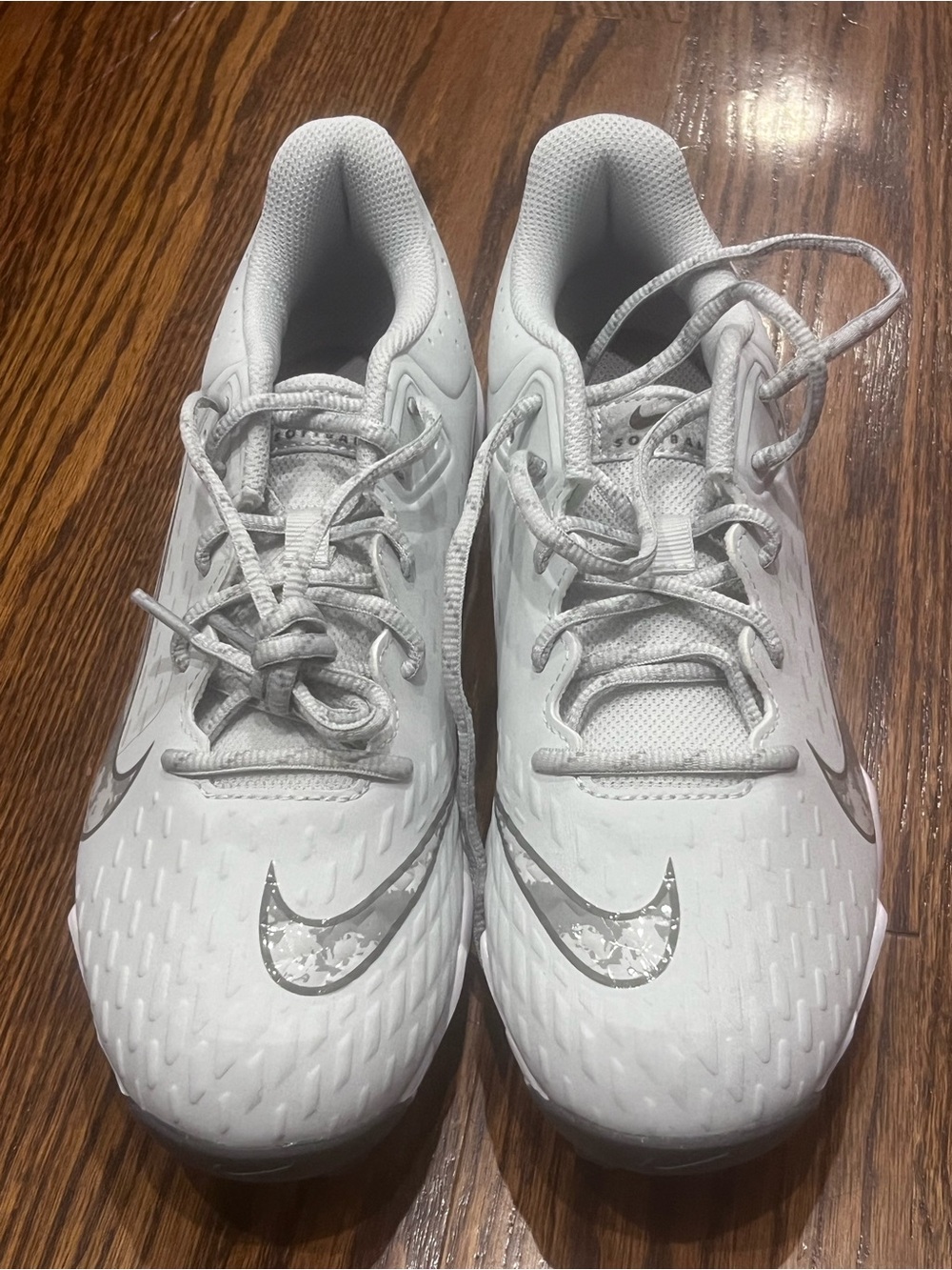 Nike White Athletic Sneakers with Silver Swoosh